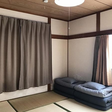 Golden Mile Apartment Amami Exterior photo