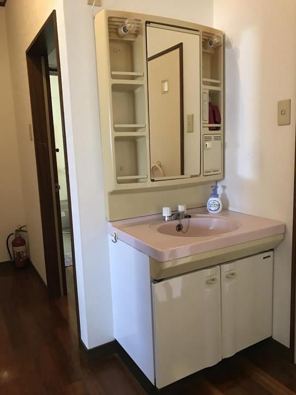 Golden Mile Apartment Amami Exterior photo