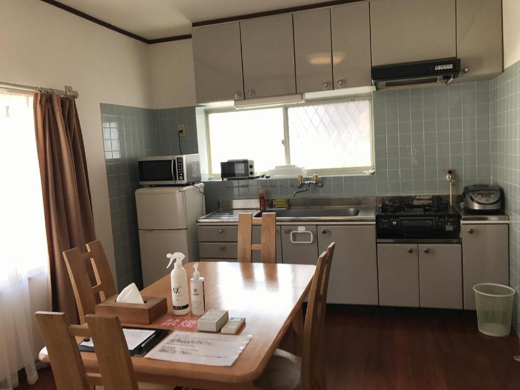 Golden Mile Apartment Amami Exterior photo